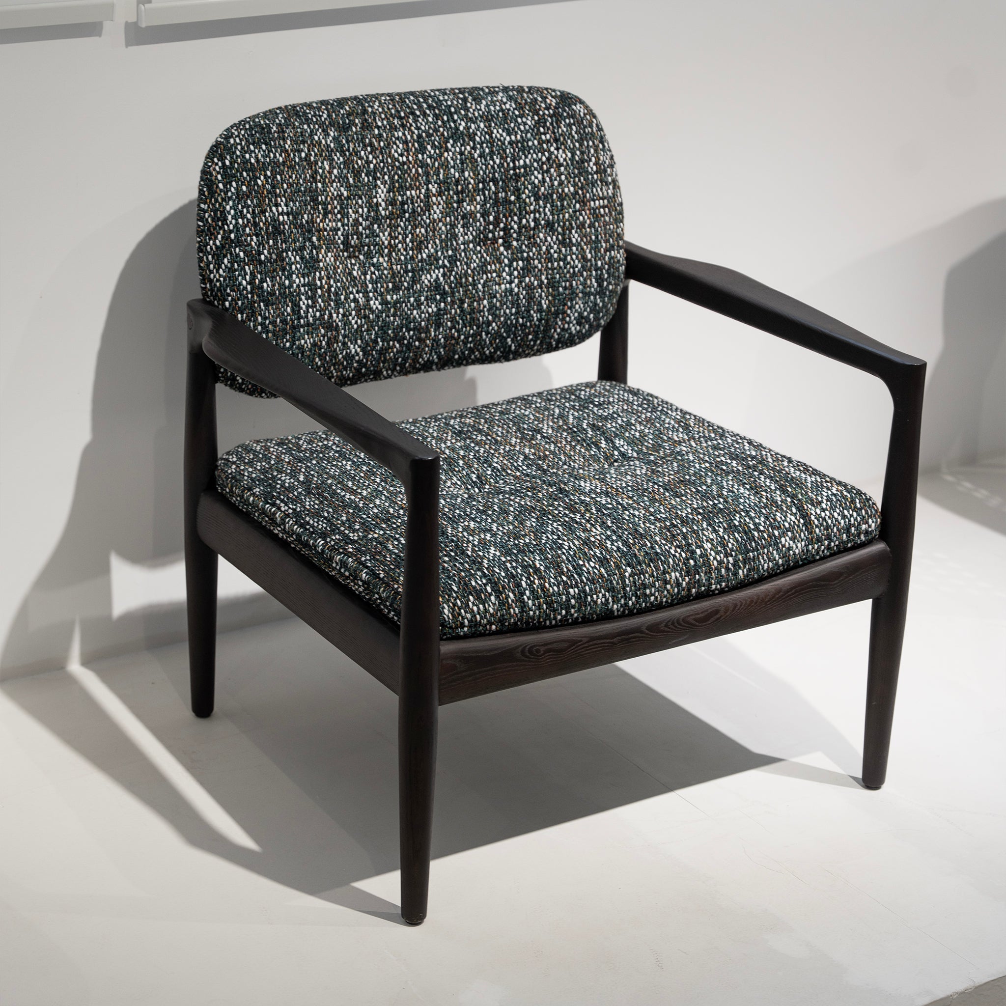 Fauteuil lounge en tweed urbain