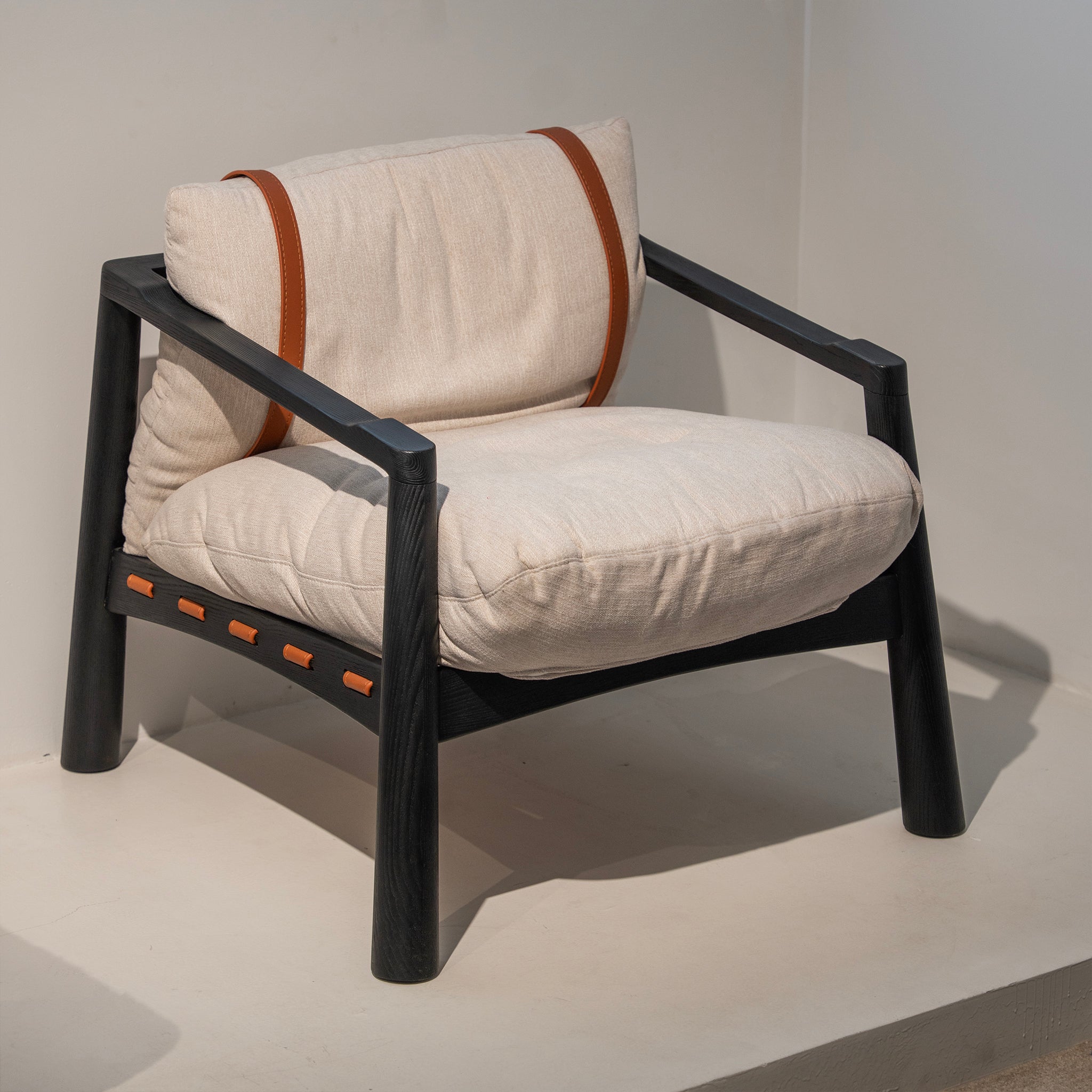 Fauteuil lounge à sangles de selle