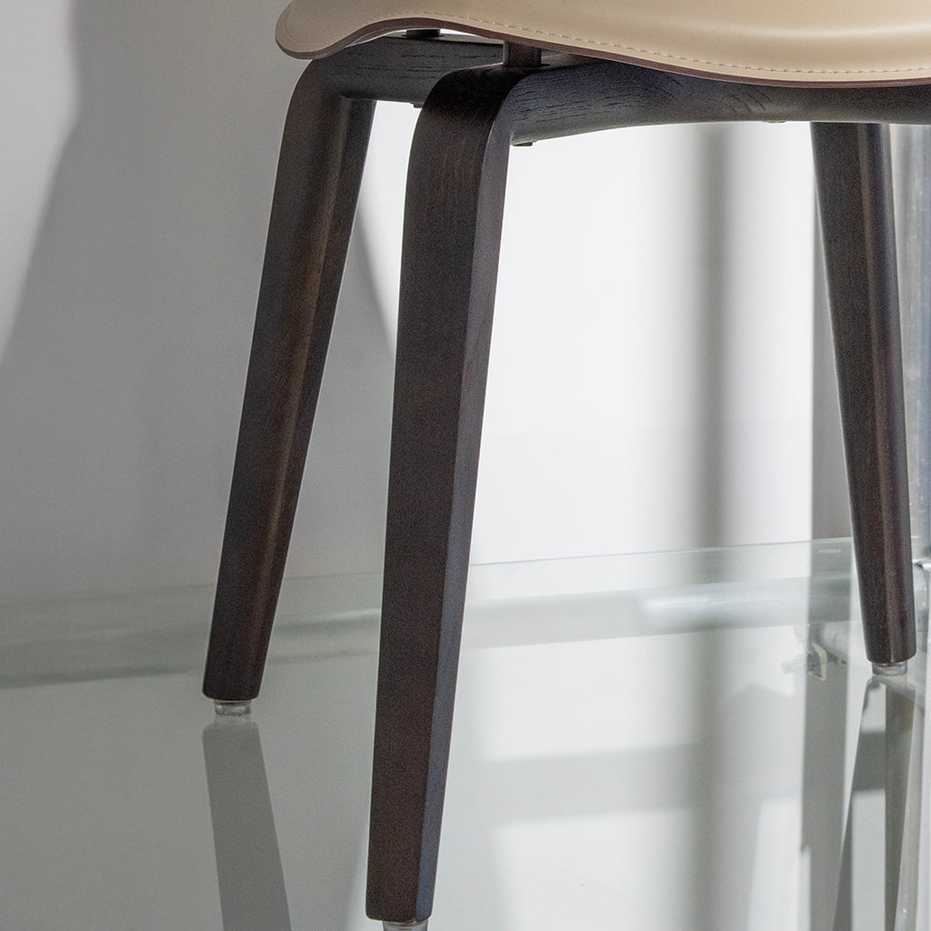 Fauteuil à coque en cuir raffiné