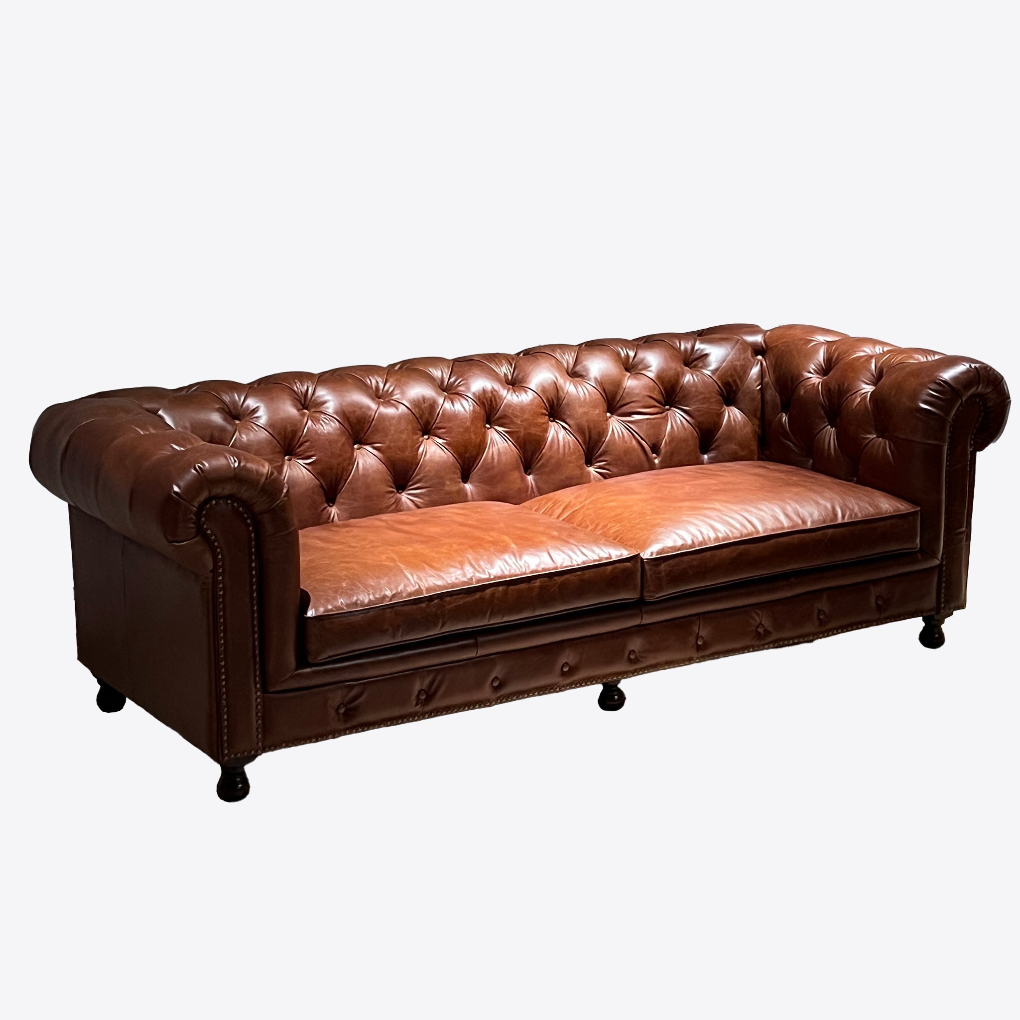 Canapé Chesterfield en cuir capitonné