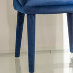 Fauteuil en velours bleu marine
