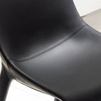 Fauteuil profilé en cuir noir