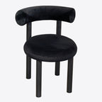 Fauteuil en velours noir moelleux