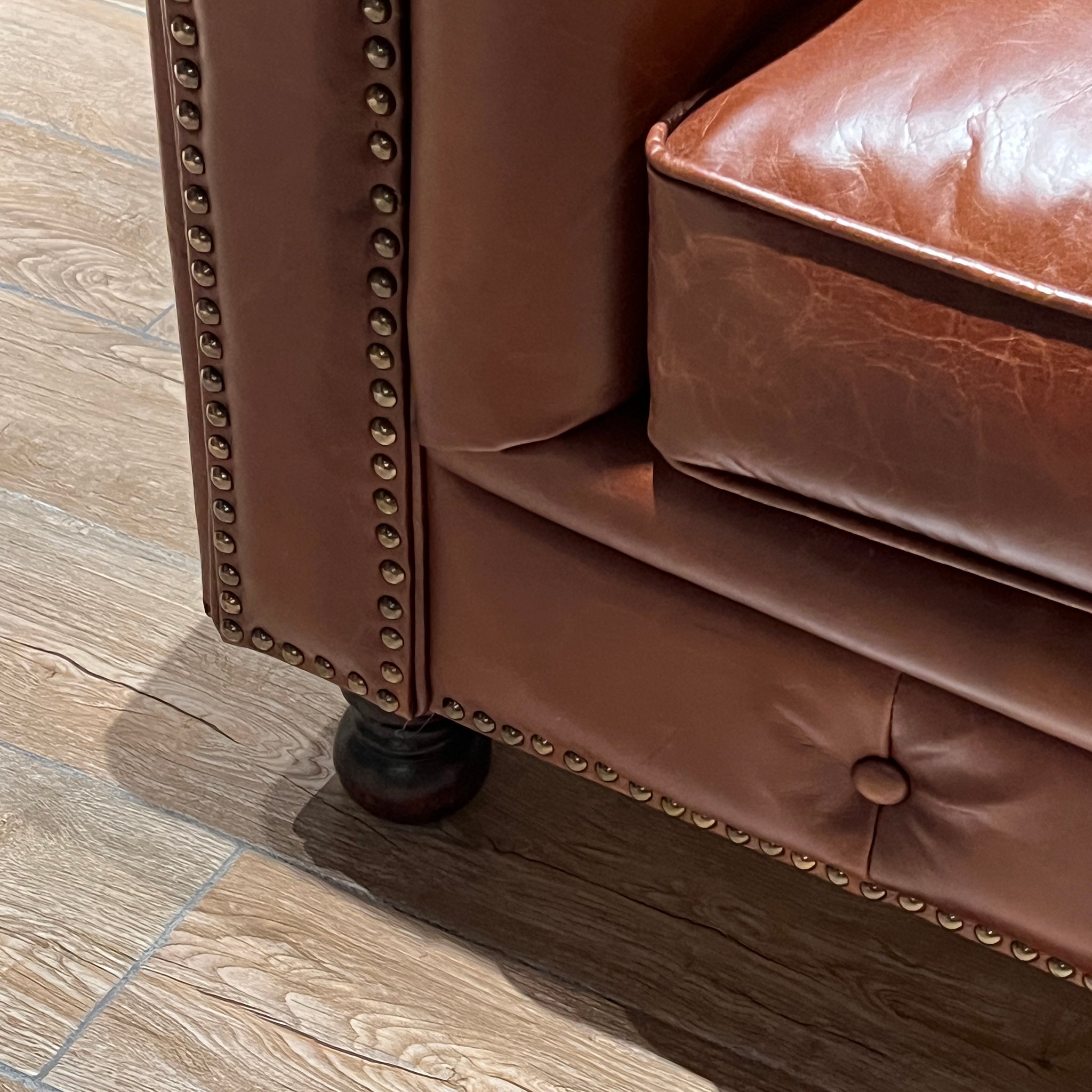 Fauteuil Chesterfield en cuir