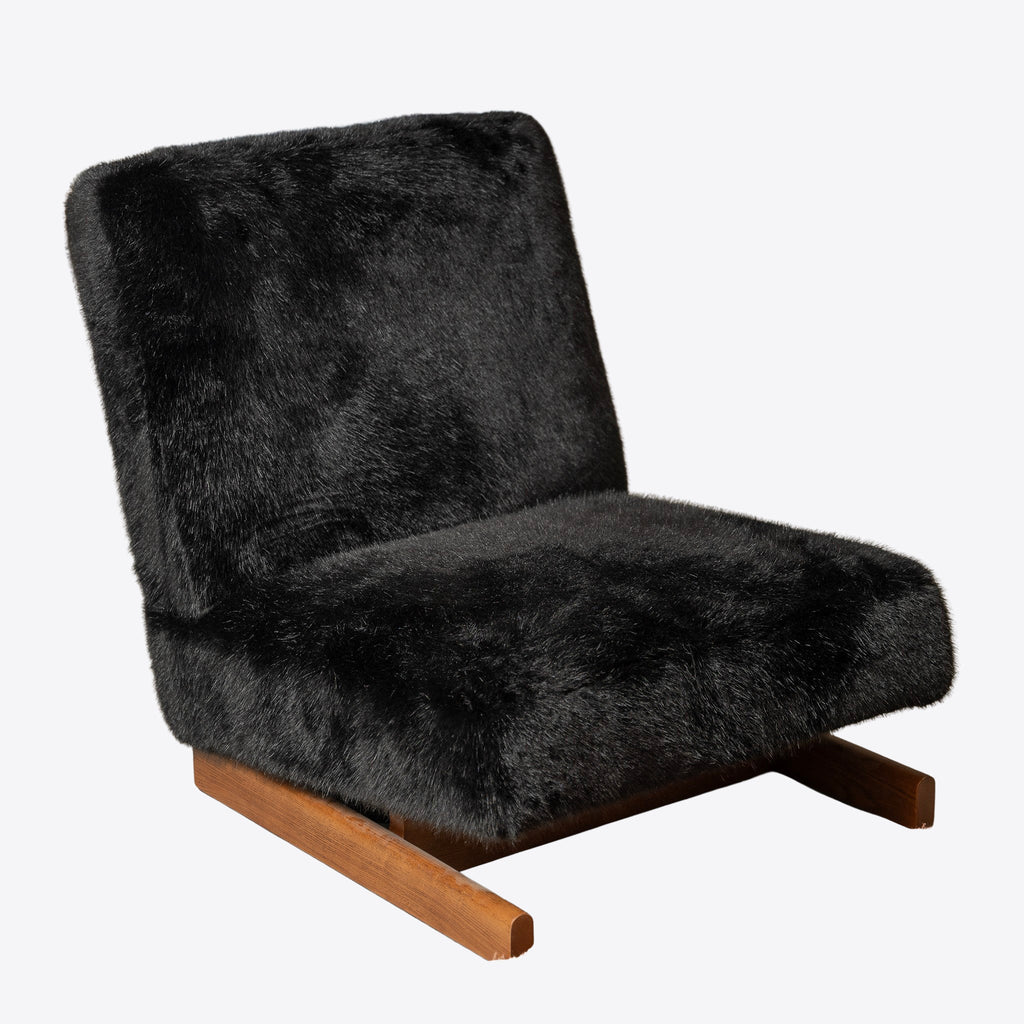 Fauteuil lounge en fourrure noire