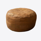 Pouf en cuir tressé